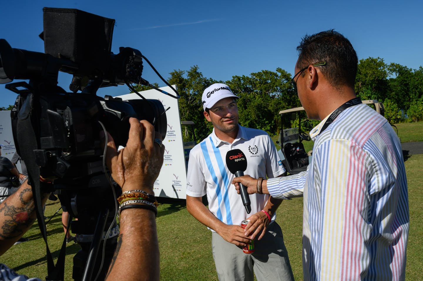 Mateo Fernandez de Oliveira of Argentina is interviewed by Claro Sports after Round Three