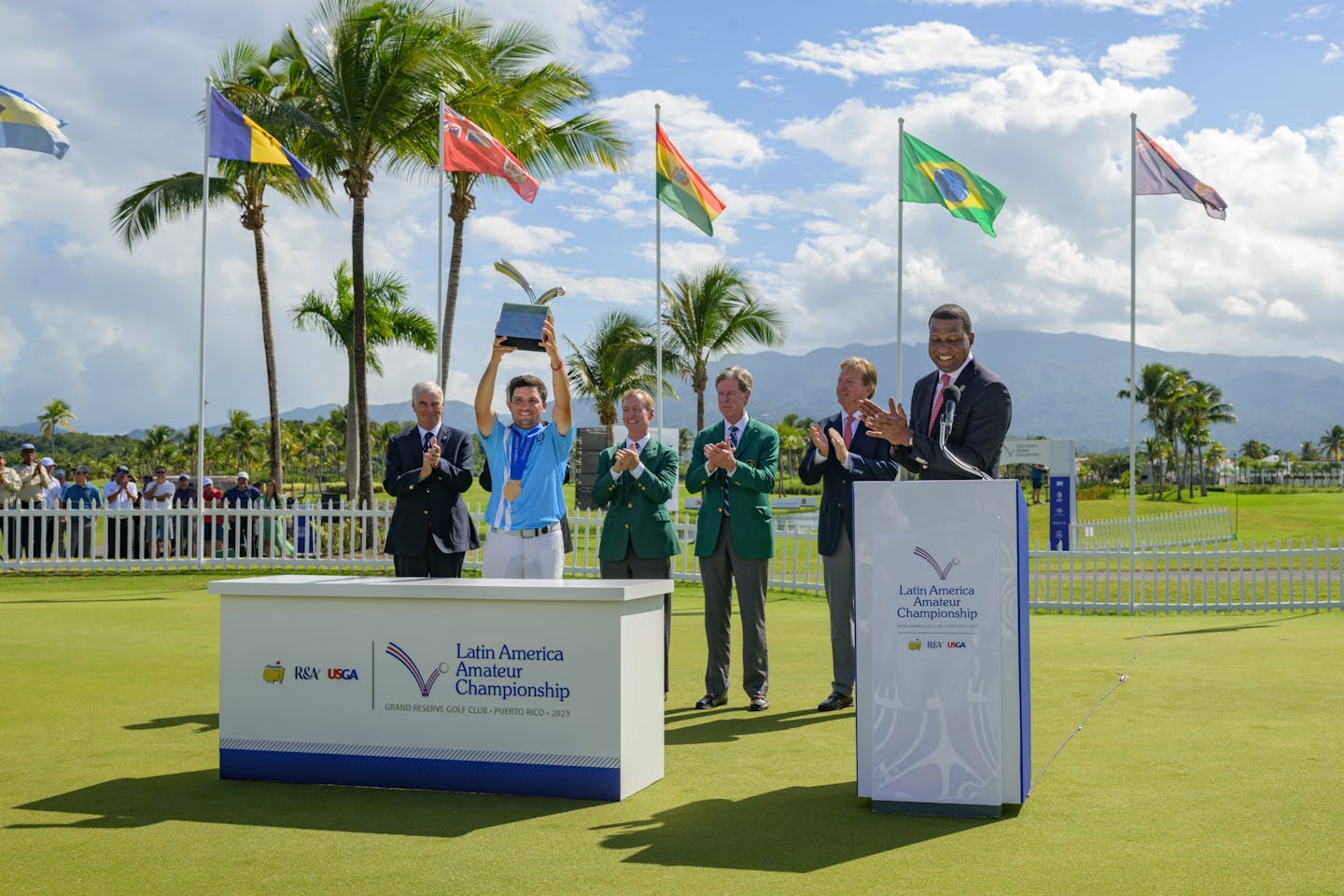 Mateo Fernandez de Oliveira of Argentina lifts the Latin American Amateur Championship trophy
